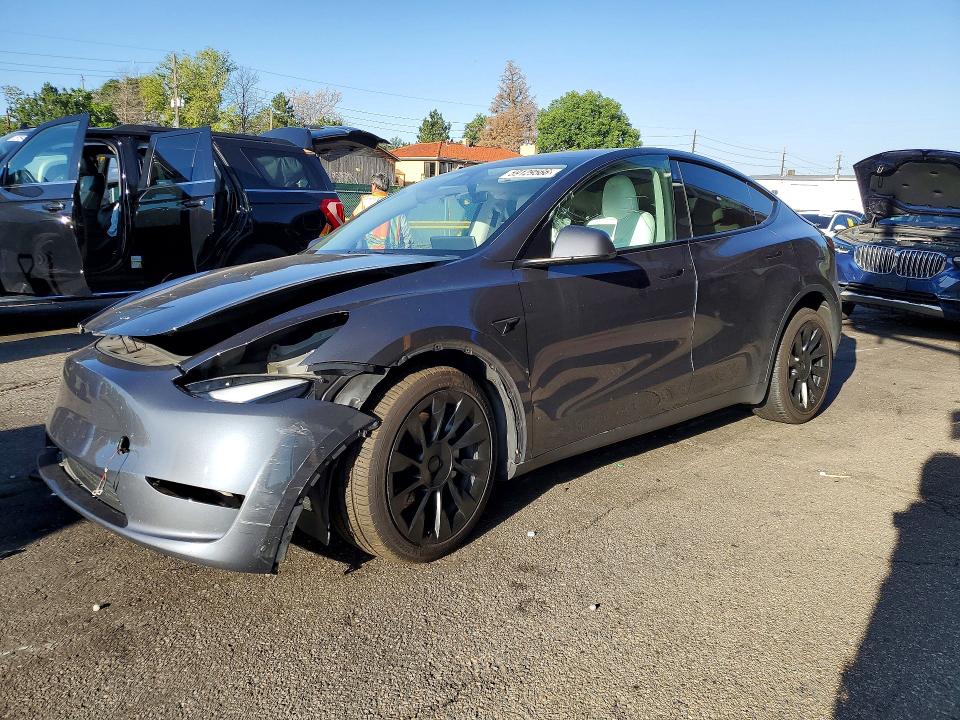 TESLA MODEL Y 2023 with VIN 7SAYGDEE8PF783884 - Photo from auction