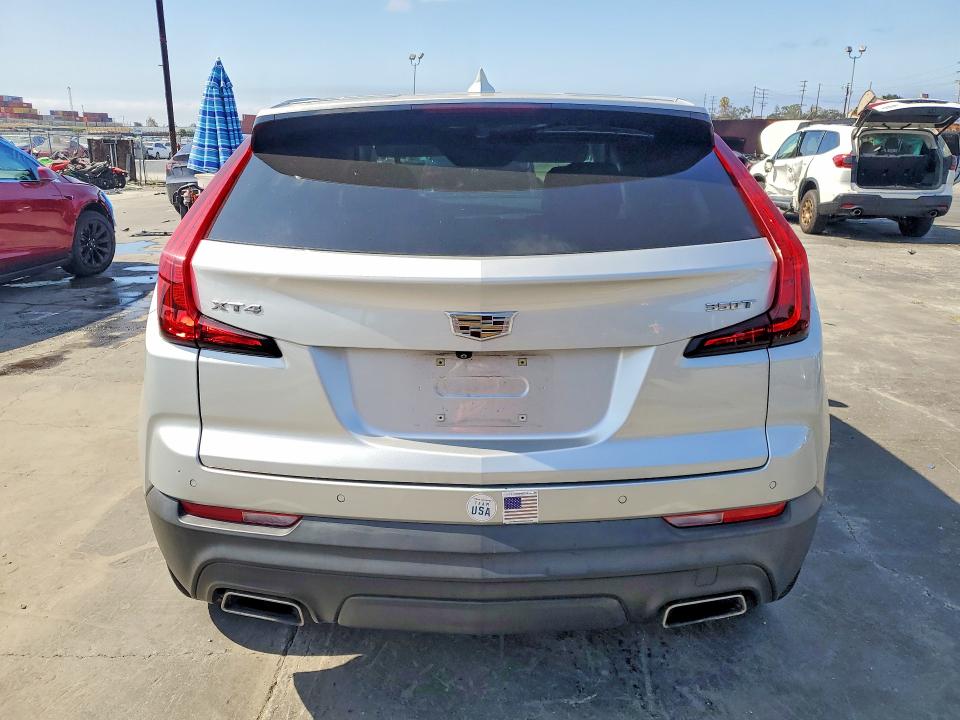 Photo 6 from auction – 2021 CADILLAC XT4 with VIN 1GYAZAR46MF003200
