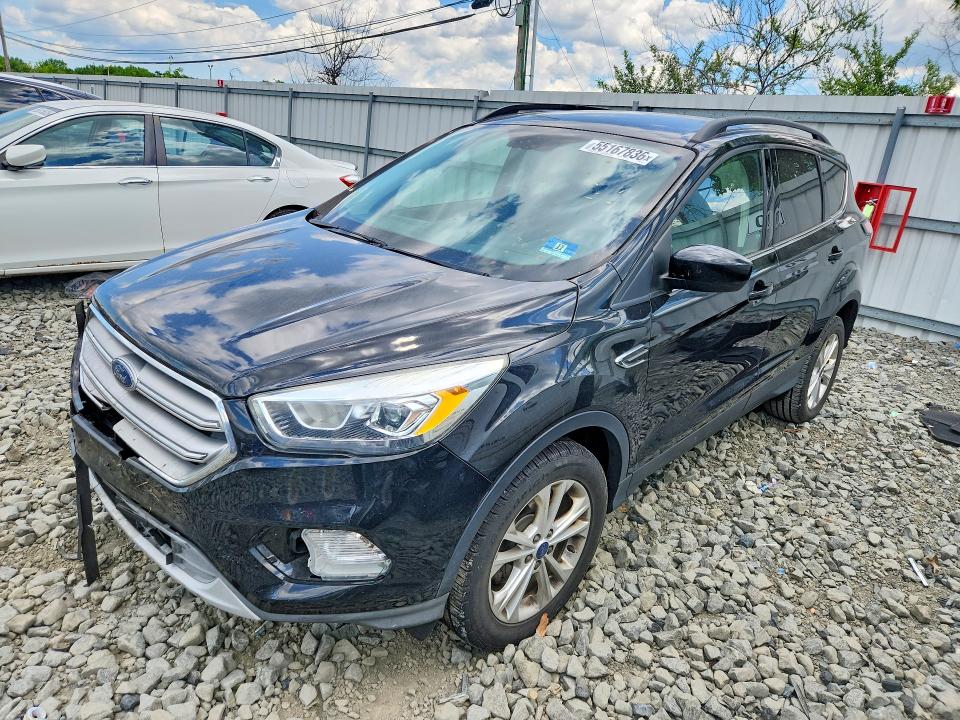 FORD ESCAPE 2017 with VIN 1FMCU0GD1HUD74594 - Photo from auction