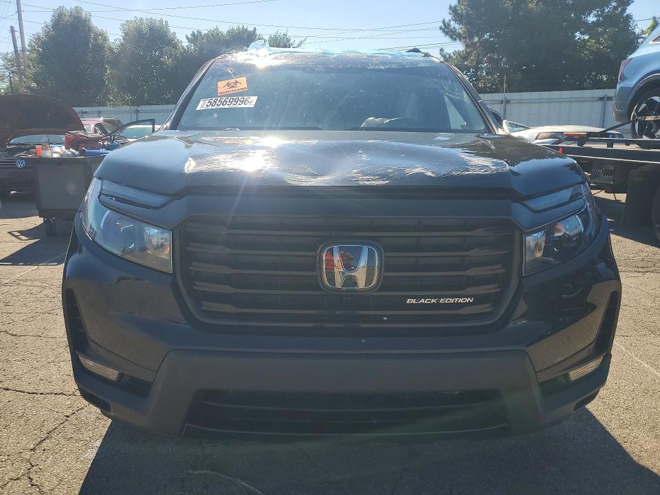 Photo 5 from auction – 2024 HONDA PASSPORT with VIN 5FNYF8H84RB002598