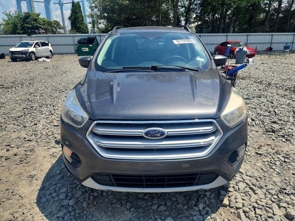 Photo 5 from auction – 2018 FORD ESCAPE with VIN 1FMCU9GD6JUA35307