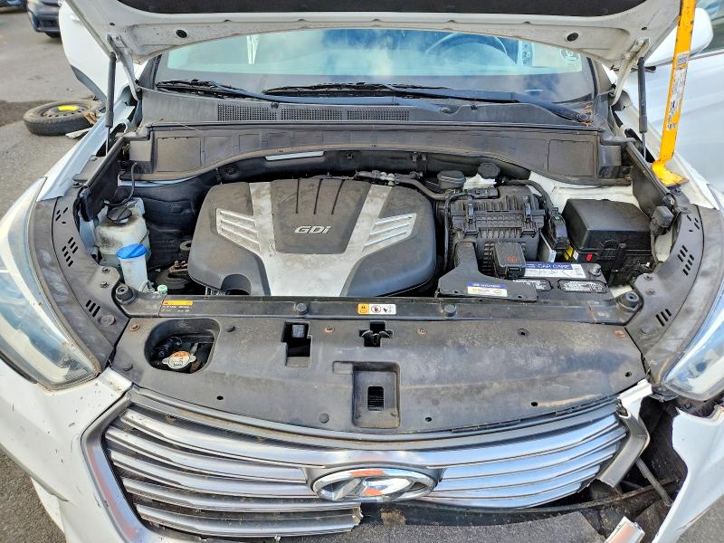 Photo 12 from auction – 2017 HYUNDAI SANTA FE with VIN KM8SR4HF4HU215489