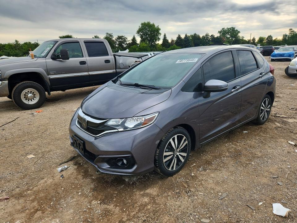 HONDA FIT 2018 with VIN 3HGGK5H94JM710981 - Photo from auction
