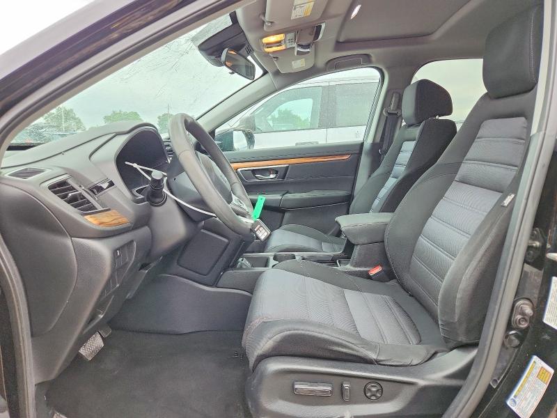 Photo 7 from auction – 2018 HONDA CR-V with VIN 7FARW2H56JE000822