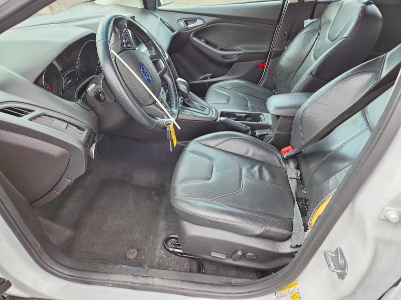 Photo 7 from auction – 2016 FORD FOCUS with VIN 1FADP3F21GL209382