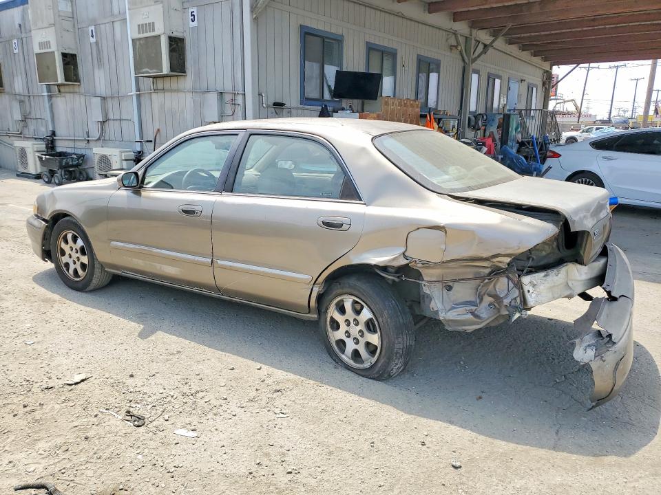 Photo 2 from auction – 1999 MAZDA 626 with VIN 1YVGF22D3X5822551