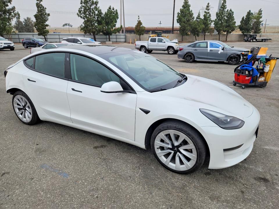 Photo 4 from auction – 2021 TESLA MODEL 3 with VIN 5YJ3E1EA1MF977855