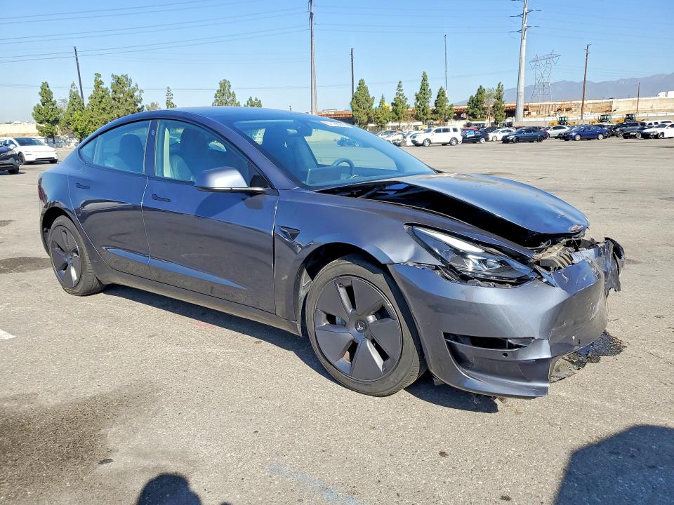 Photo 4 from auction – 2022 TESLA MODEL 3 with VIN 5YJ3E1EA4NF336359
