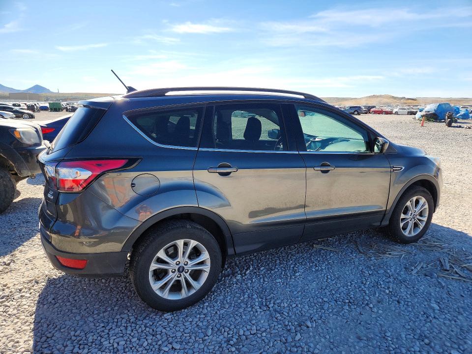 Photo 3 from auction – 2018 FORD ESCAPE with VIN 1FMCU9GD3JUA99479