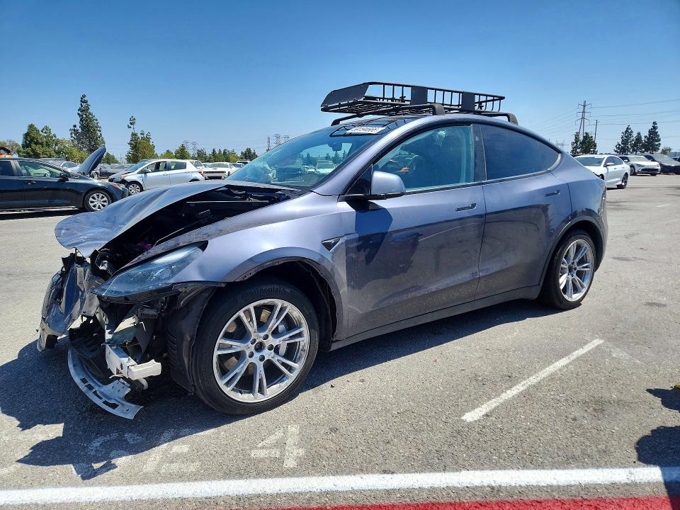 TESLA MODEL Y 2023 with VIN 7SAYGAEE3PF905534 - Photo from auction