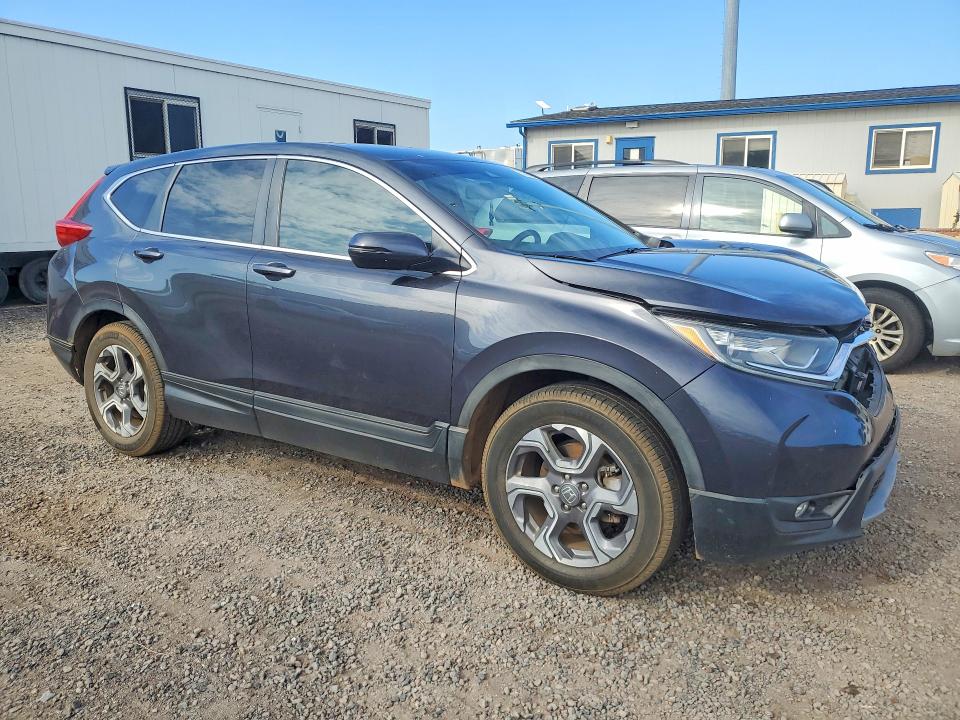 Photo 4 from auction – 2018 HONDA CR-V with VIN 7FARW1H89JE023208