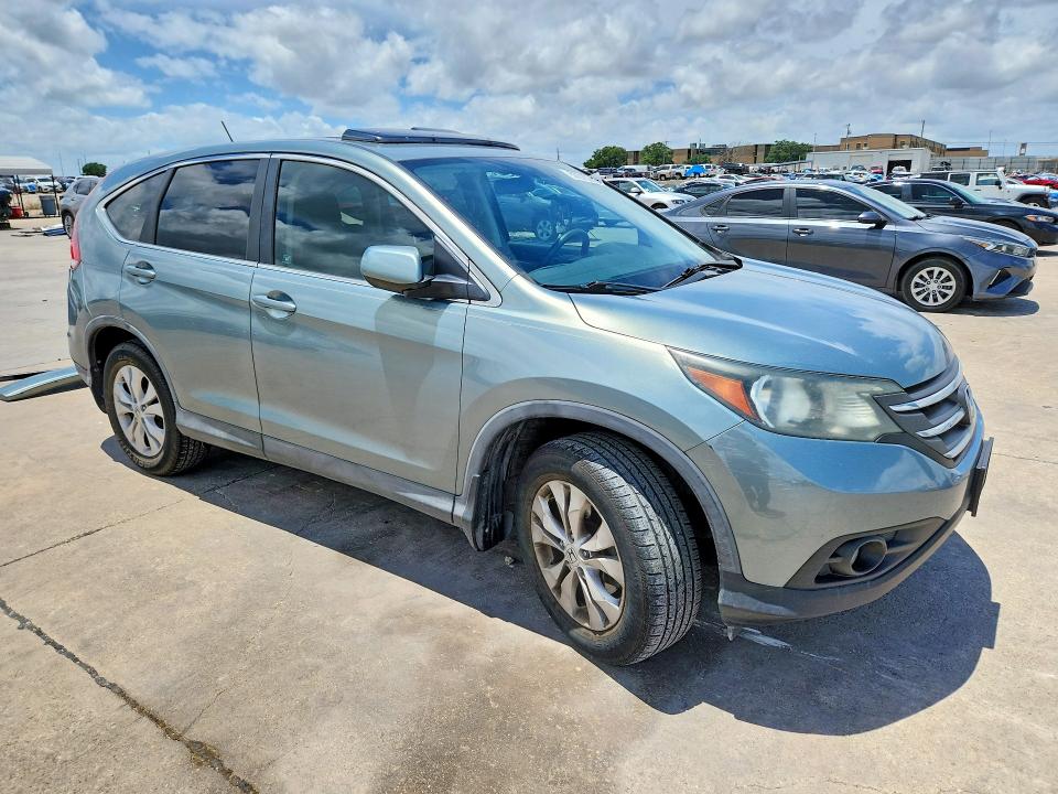 Photo 4 from auction – 2012 HONDA CR-V with VIN 5J6RM3H57CL010809