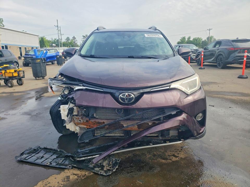 Photo 5 from auction – 2018 TOYOTA RAV4 with VIN 2T3RFREV4JW812817