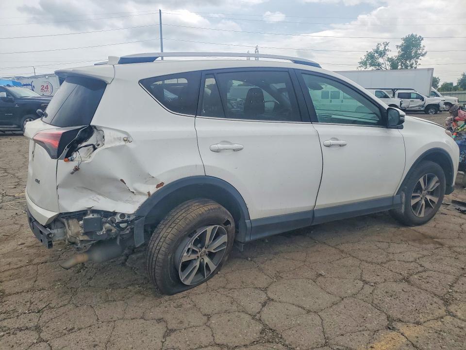 Photo 3 from auction – 2018 TOYOTA RAV4 with VIN 2T3WFREV6JW517513