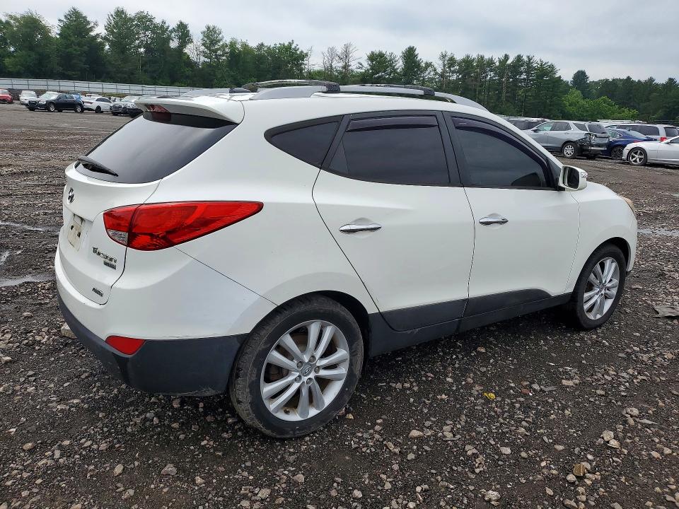 Photo 3 from auction – 2012 HYUNDAI TUCSON with VIN KM8JUCAC0CU405268