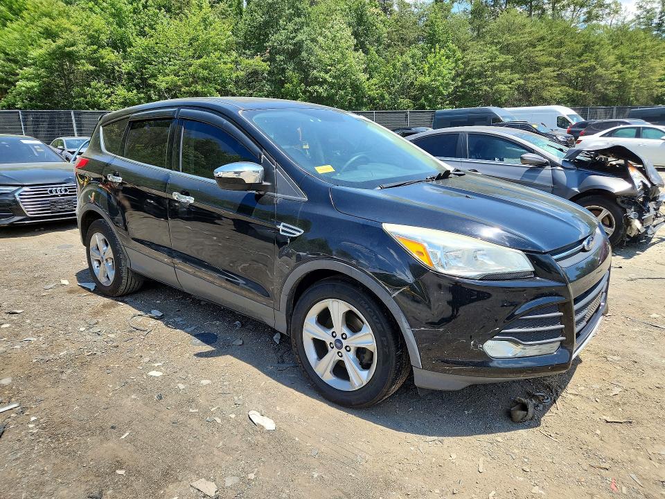 Photo 4 from auction – 2016 FORD ESCAPE with VIN 1FMCU0G75GUA89597