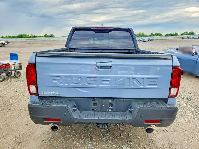 Photo 6 from auction – 2024 HONDA RIDGELINE with VIN 5FPYK3F89RB023083