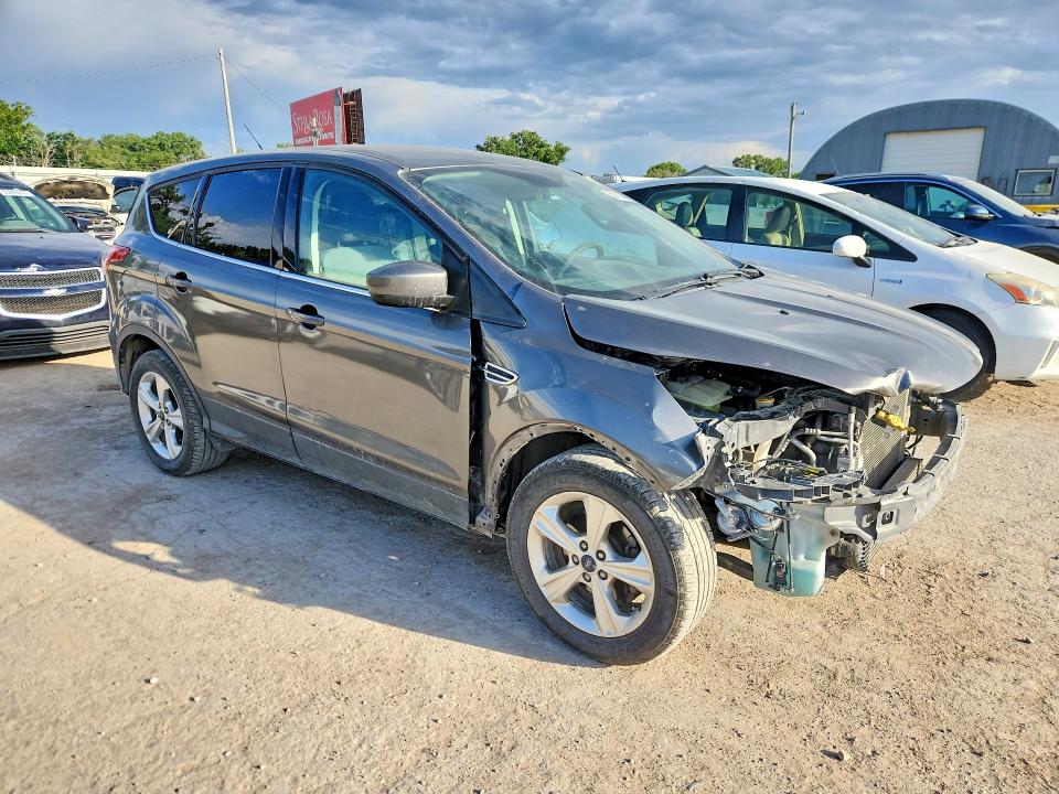 Photo 4 from auction – 2014 FORD ESCAPE with VIN 1FMCU0GX7EUC58936