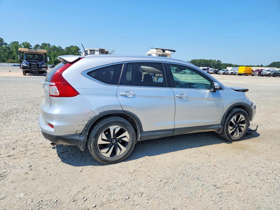 Photo 3 from auction – 2015 HONDA CR-V with VIN 5J6RM4H93FL058384