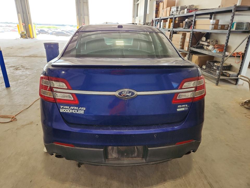 Photo 6 from auction – 2014 FORD TAURUS with VIN 1FAHP2H80EG104299