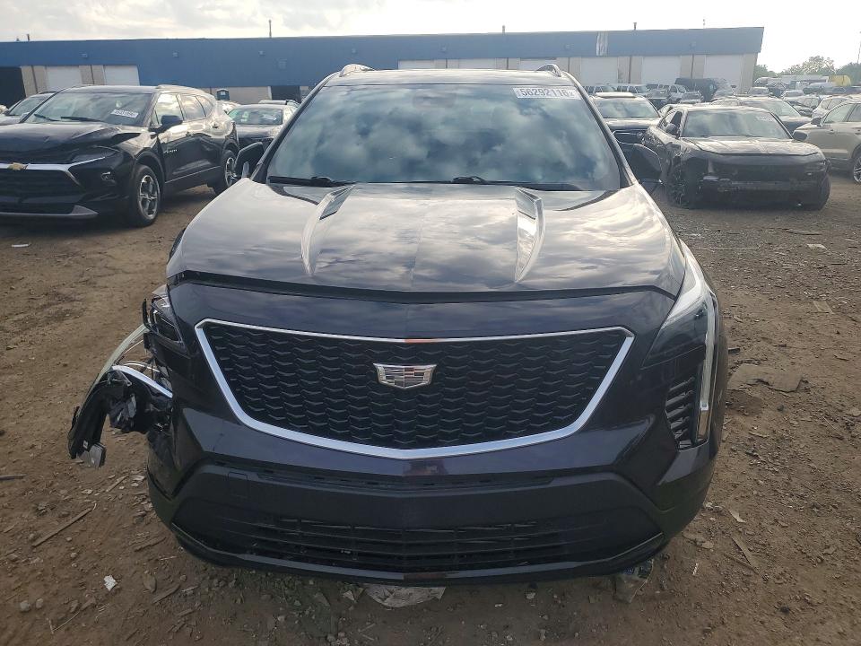 Photo 5 from auction – 2022 CADILLAC XT4 with VIN 1GYFZFR48NF109667