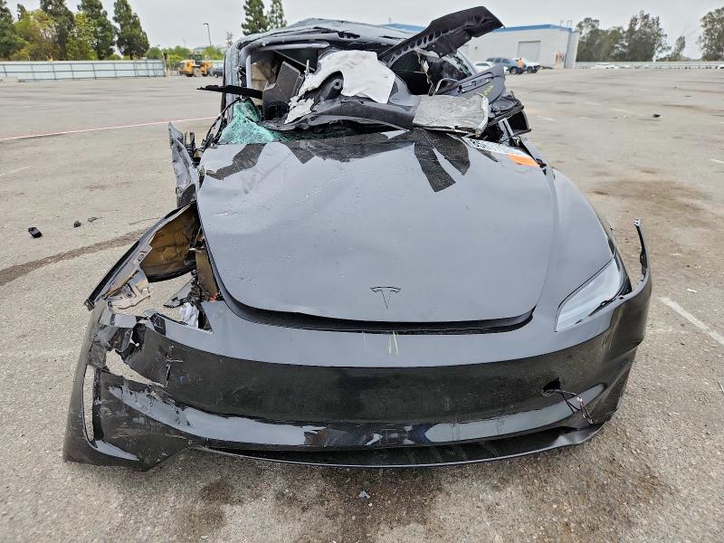Photo 11 from auction – 2026 TESLA MODEL 3 with VIN 5YJ3E1ET0TF195000