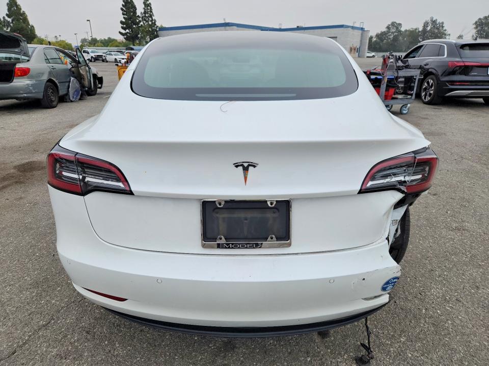 Photo 6 from auction – 2021 TESLA MODEL 3 with VIN 5YJ3E1EA1MF977855