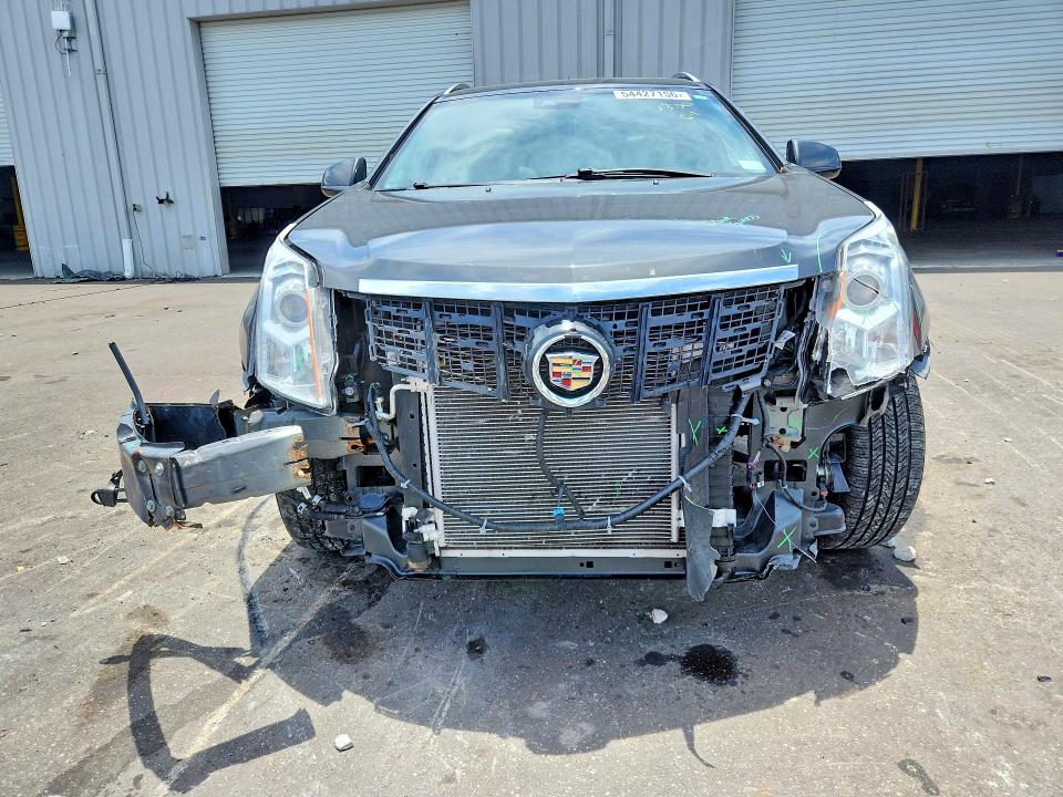 Photo 5 from auction – 2015 CADILLAC SRX with VIN 3GYFNBE31FS641227