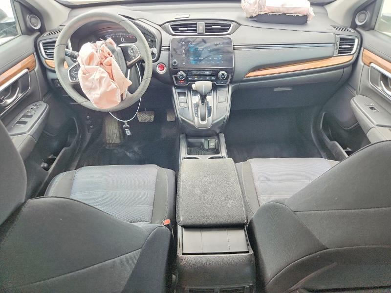 Photo 8 from auction – 2018 HONDA CR-V with VIN 2HKRW2H52JH673538
