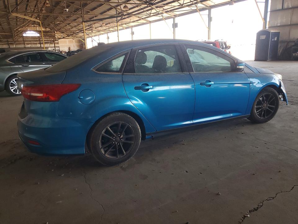 Photo 3 from auction – 2016 FORD FOCUS with VIN 1FADP3F27GL225117