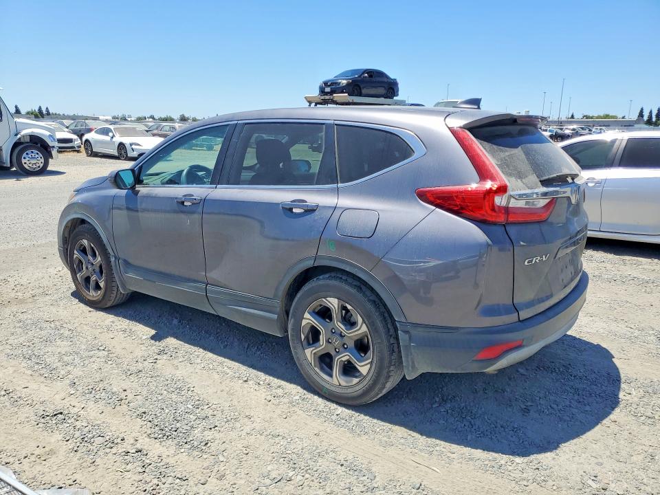Photo 2 from auction – 2018 HONDA CR-V with VIN 2HKRW1H59JH508581