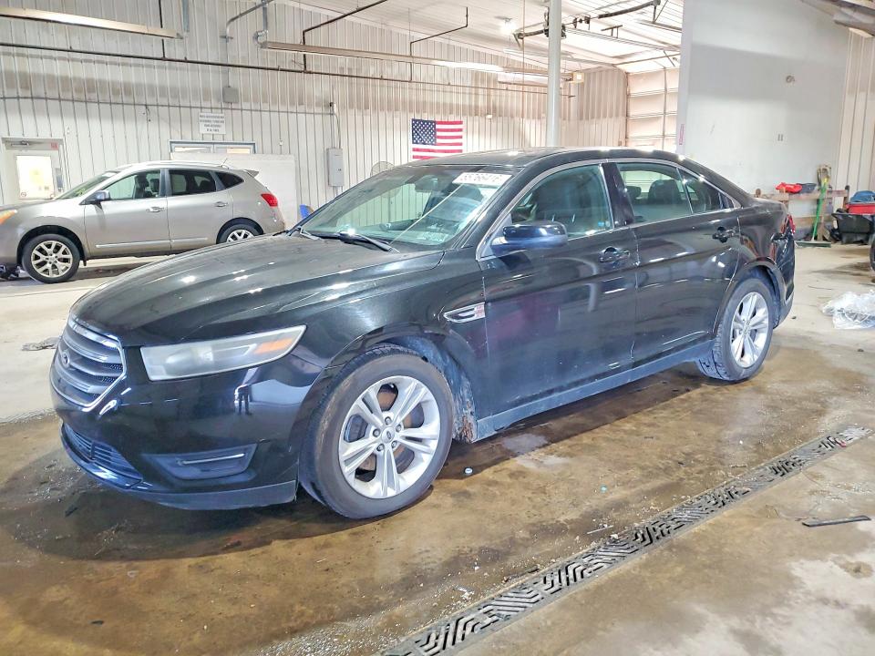 FORD TAURUS 2015 with VIN 1FAHP2E85FG122075 - Photo from auction