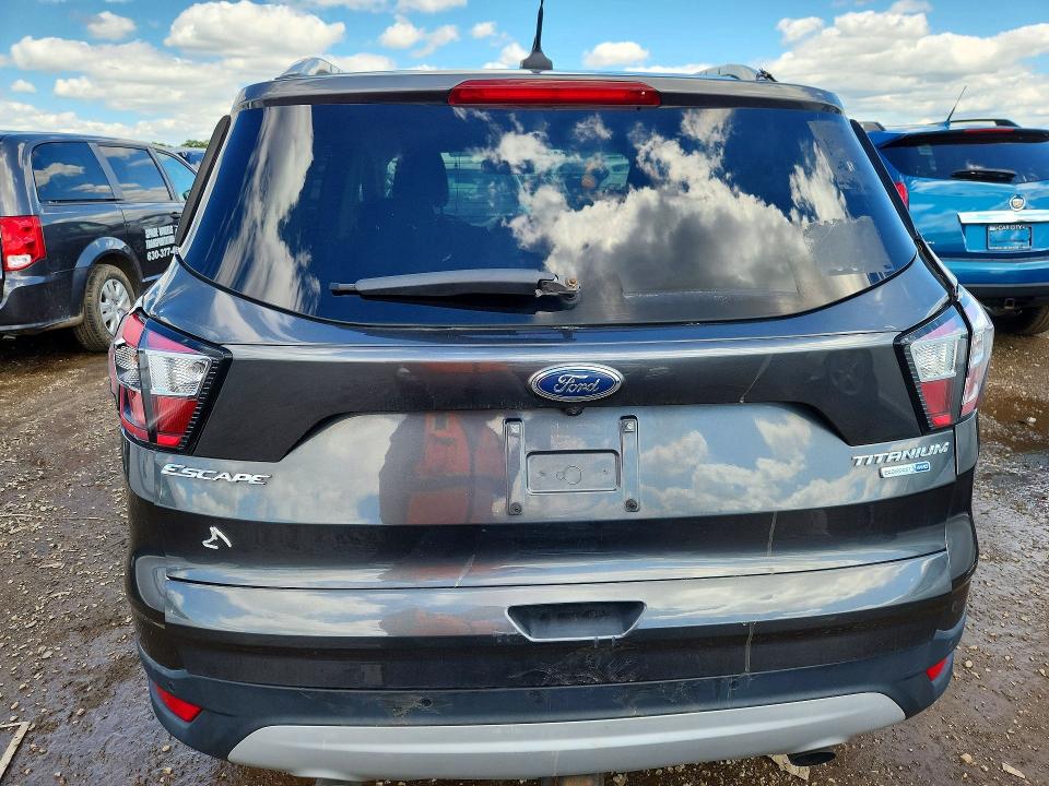 Photo 6 from auction – 2018 FORD ESCAPE with VIN 1FMCU9J95JUD34890