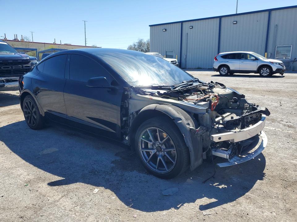 Photo 4 from auction – 2023 TESLA MODEL 3 with VIN 5YJ3E1EA2PF397910