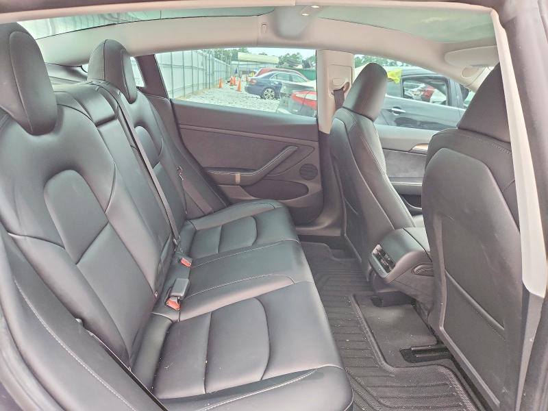 Photo 10 from auction – 2023 TESLA MODEL 3 with VIN 5YJ3E1EAXPF665943