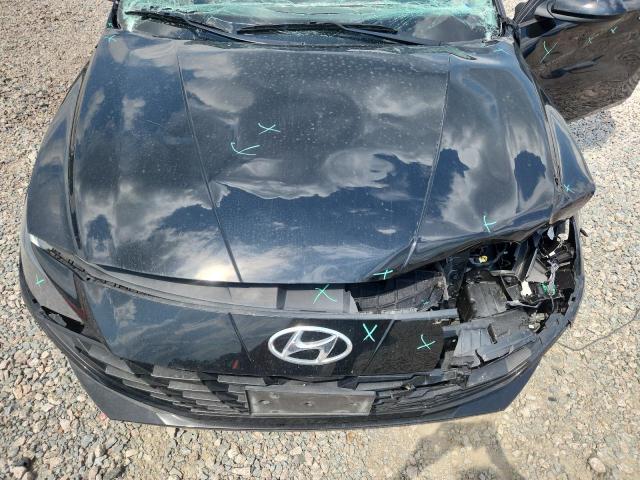 Photo 11 from auction – 2023 HYUNDAI ELANTRA with VIN 5NPLM4AG7PH094430