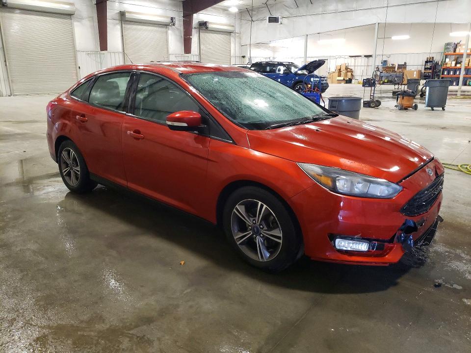 Photo 4 from auction – 2018 FORD FOCUS with VIN 1FADP3FE8JL240985