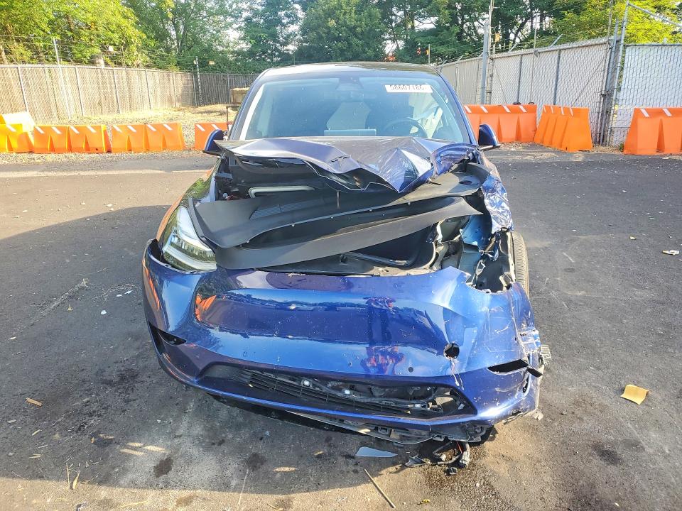 Photo 5 from auction – 2022 TESLA MODEL Y with VIN 7SAYGDEE7NF344995