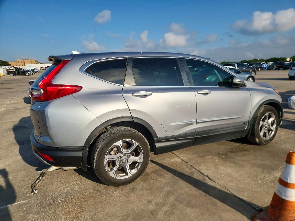 Photo 3 from auction – 2019 HONDA CR-V with VIN 7FARW1H5XKE027016