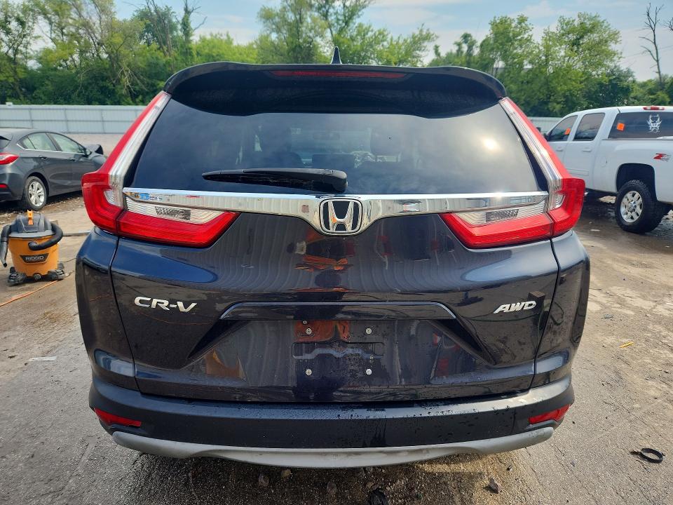 Photo 6 from auction – 2017 HONDA CR-V with VIN 5J6RW2H5XHL058719