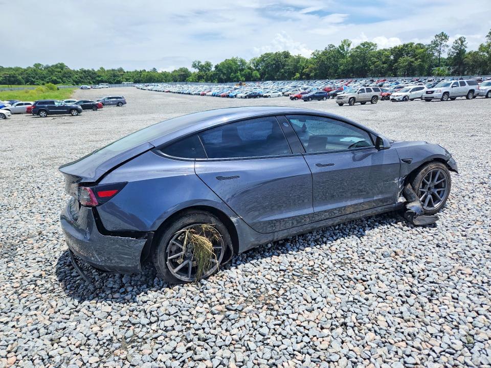 Foto 3 de la subasta – 2022 TESLA MODEL 3 con VIN 5YJ3E1EA4NF189993