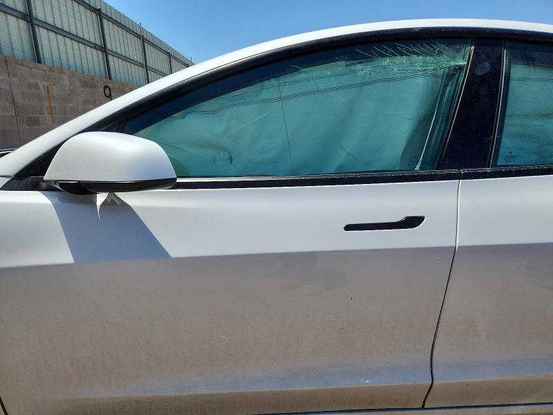Photo 7 from auction – 2021 TESLA MODEL 3 with VIN 5YJ3E1EA7MF989590