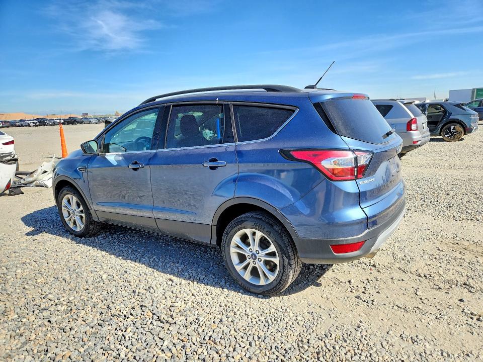 Photo 2 from auction – 2018 FORD ESCAPE with VIN 1FMCU9GD8JUA23241