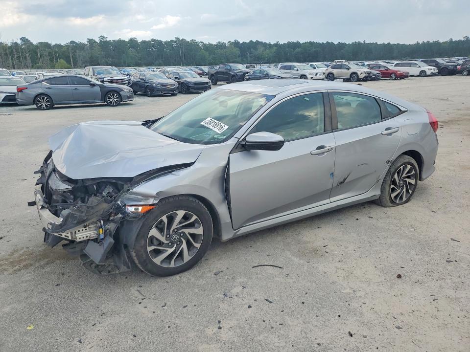 HONDA CIVIC 2018 with VIN 19XFC2F72JE013083 - Photo from auction