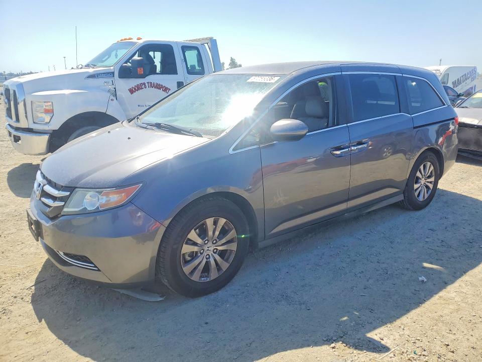 HONDA ODYSSEY 2016 with VIN 5FNRL5H3XGB163311 - Photo from auction