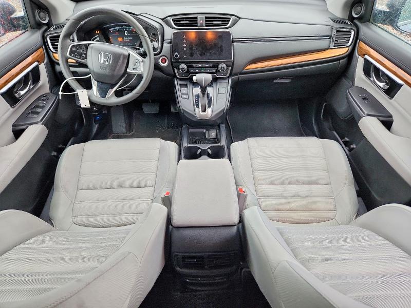 Photo 8 from auction – 2018 HONDA CR-V with VIN 7FARW2H57JE008900