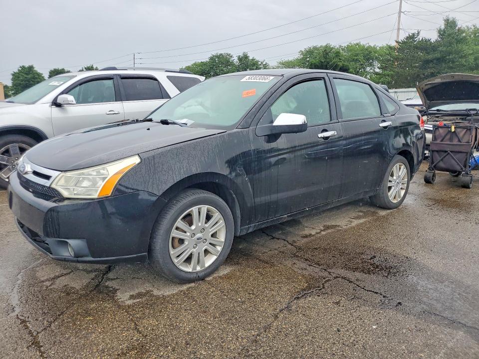 FORD FOCUS 2011 with VIN 1FAHP3HN4BW102259 - Photo from auction