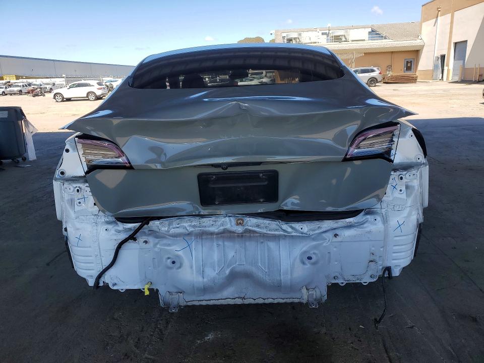 Photo 6 from auction – 2021 TESLA MODEL 3 with VIN 5YJ3E1EA6MF928800
