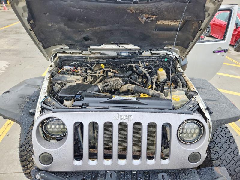 Photo 12 from auction – 2011 JEEP WRANGLER with VIN 1J4AA5D10BL503251