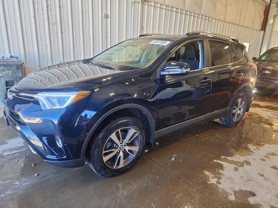 TOYOTA RAV4 2017 with VIN JTMRFREV5HJ135396 - Photo from auction